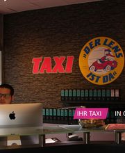 Taxi Lens Bild 1