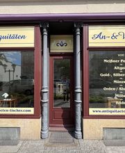 Antiquitäten-Tischer Bild 2