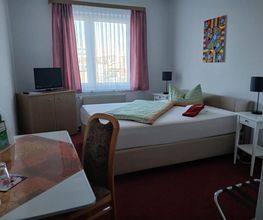 Einzelzimmer mit Doppelbett