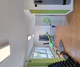 Trainingsraum_Rumpftrainer_Beinpresse.jpg