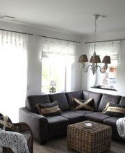 Wohnzimmer im Ferienhaus Deichkörnchen Neßmersiel www.nord-sterne.de
