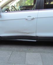 Chevrolet Captiva Schadenbreich Tür vorne und hinten links.