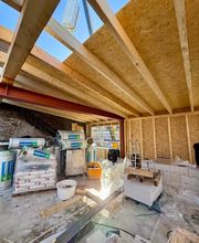 Innenausbau mit moderner Holzkonstruktion, Dachöffnung und hochwertiger Dämmung - Gellenbeck Holzbau GmbH