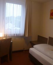 Einzelzimmer mit Dusche und WC