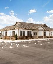 Community clubhouse adjacent to the pool.