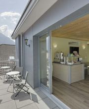 Terrasse Penthouse Aufenthaltsraum Hostel Alplodge