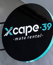 anuncio de logo en el local letras xcape 39 