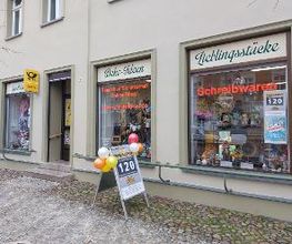 Geschenkartikel & Postagentur Romy + Daniel Fester Bild 1