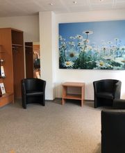 Neuroth Hörcenter AG - Hörgeräte und Gehörschutz Bild 3