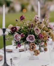 Floral arrangement in pink and purple tones