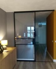 Industriële schuifdeur gang-woonkamer