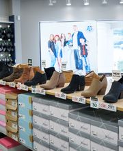 Shot of Popular Brand Section (I.e. Croc Shoe Wall)