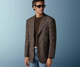 This mid brown checked blazer is cut to a relaxed fit — roomy through the chest and waist with a soft, natural shoulder — and features a notch lapel, patch pockets, and half-canvas construction.