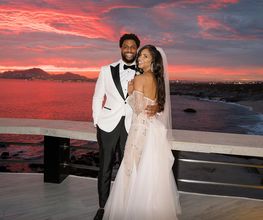 Deana and Reggie celebrating their Cabo Wedding at Sunset Monalisa