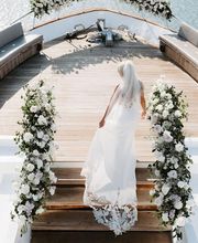 A bride of ours walking through Pelican Boat