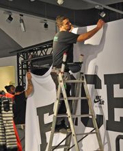 Stoffdruck und Montage für eine Veranstaltung Furore-Werbung