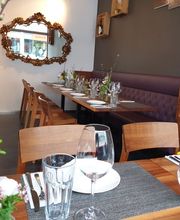 Volver - Café Tapas Vinos Bild 1