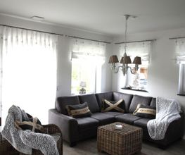 Wohnzimmer im Ferienhaus Deichkörnchen Neßmersiel www.nord-sterne.de