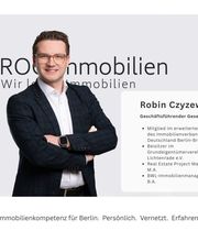 Robin Czyzewski, geschäftsführender Gesellschafter von ROC Immobilien GmbH in Berlin. Das Bild zeigt ihn mit Informationen zu seiner Immobilienkompetenz, seiner Verbandsarbeit und seiner Erfahrung im Berliner Immobilienmarkt.