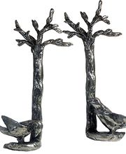 Poignée de Porte Oiseau dans l'arbre qui orne la porte d'entrée de la galerie 24 rue du Bac. Création et Fabrication en France par SIECLE Paris.