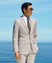 A well-tailored suit remains the defining element of a truly complete wardrobe.