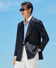 Precision-tailored blazers in timeless colors enhance every part of a man’s wardrobe.