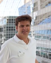 Zahnarztpraxis am Flughafen München, Dr. med. dent. Klaus Schneider