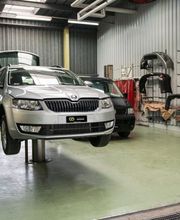 Garage R. Grünig AG / Carosserie Bild 8