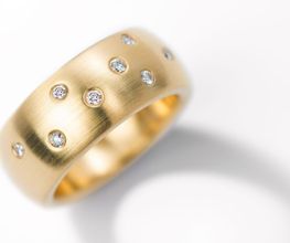 750/000 Gelbgoldring mit Brillanten