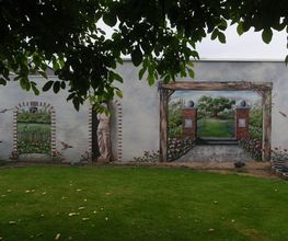 muurschildering tuin