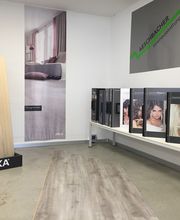 Austellung -  Aeschbacher Innenausstattungen - Bodenbelägen - Bettwaren, Vorhänge, Lederwaren, Geburtsanzeigetafeln und Kinderartikel - in Biberist bei Solothurn