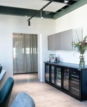 BUZZINLAB – The Club Office in Stuttgart: Eventlocation, Rooftop, Coworking Space, Tagungen, Workshops, Catering, Fotostudio, Podcast-Studio.