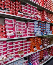 Shot of Popular Brand Section (I.e. Croc Shoe Wall)