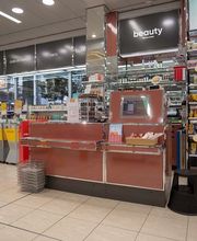 cassiere-farmacia-sun-store-lugano-peri