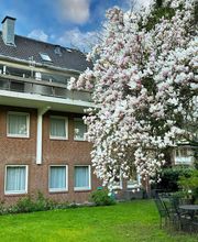 Gartenbereich und Rückansicht des Boutique Hotel Rosengarten Hamburg