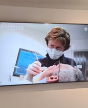 Zahnarzt Dr. Thomas Thometzki, M. Sc. Implantologie & orale Chirurgie, Ästhetik und Veneers Bild 4