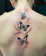 Raketenwacholder Tattoo und Piercing Bild 2