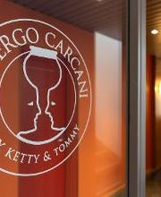 Hotel Albergo Carcani by Ketty & Tommy in Ascona – Hoteleingang mit Logo an der Eingangstür