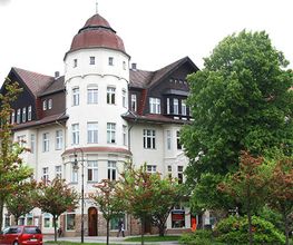 Aussenansicht der Augusta-Apotheke am Mexikoplatz