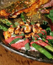 Asparagus with labneh and pink tahini