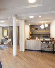 Neuroth Hörcenter AG - Hörgeräte und Gehörschutz Bild 2