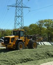 Grasoogst JCB shovel 435
