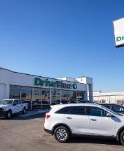 Wide shot of exterior/front of dealership