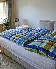 Boxspring-Schlafsofa in der Lütten Stuv als Bett