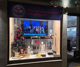 Unser Optik-Schaufenster zu Weihnachten mit Jubiläum