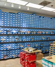Shot of Popular Brand Section (I.e. Croc Shoe Wall)