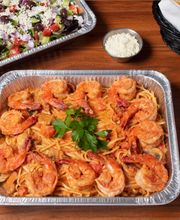 Family Pasta Combo (Spicy Prawn Linguine): Feeds 4-6 and includes 1 pasta, 1 salad, and grilled artisan bread.