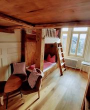 Our triple room Swiss style is a warm wooden wonder