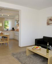 Wohn- und Esszimmerbereich der Ferienwohnung "Elstar"