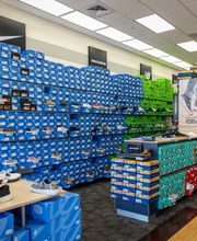 Shot of Popular Brand Section (I.e. Croc Shoe Wall)